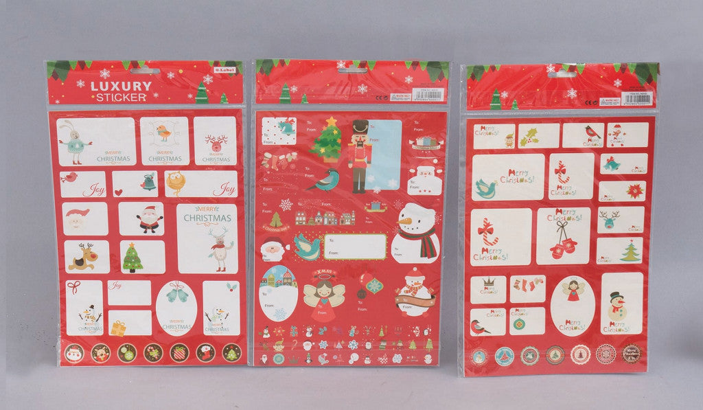 50 Adesivi Chiudipacco Carta Su Cartella Cm.21X35 Modelli Assortitoi decorazione di Natale